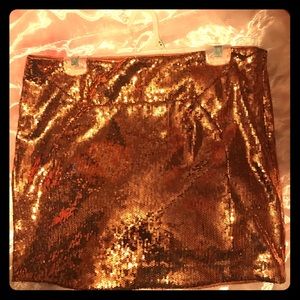 Diane Von Furstenberg copper mini size 12